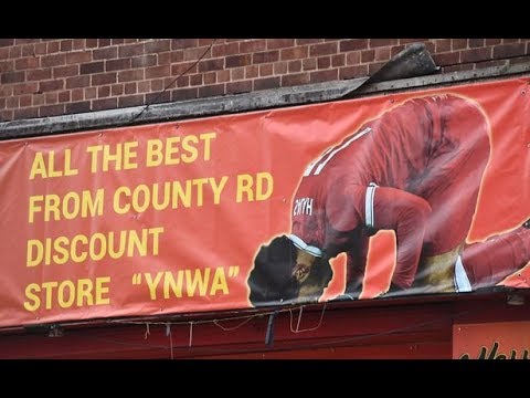 Mohamed Salah banner above shop on County Road Walton