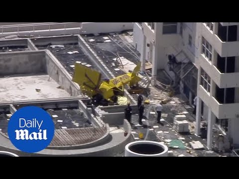 Pilot dead as small plane crashes into condo building in FL